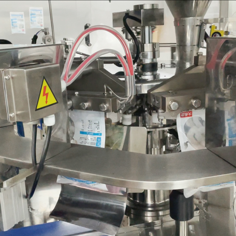 খাদ্য গ্রেড স্বয়ংক্রিয় ভ্যাকুয়াম ফ্রোজেন ফুড পাউচ প্যাকিং মেশিন চিংড়ি স্কুইড রিং ব্যাগ মাল্টিহেড ওয়েইগার ফিলিং প্যাকিং মেশিন